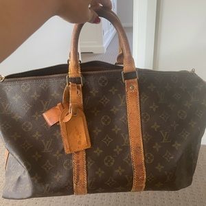 Louise Vuitton travel bag AUTHENTIC